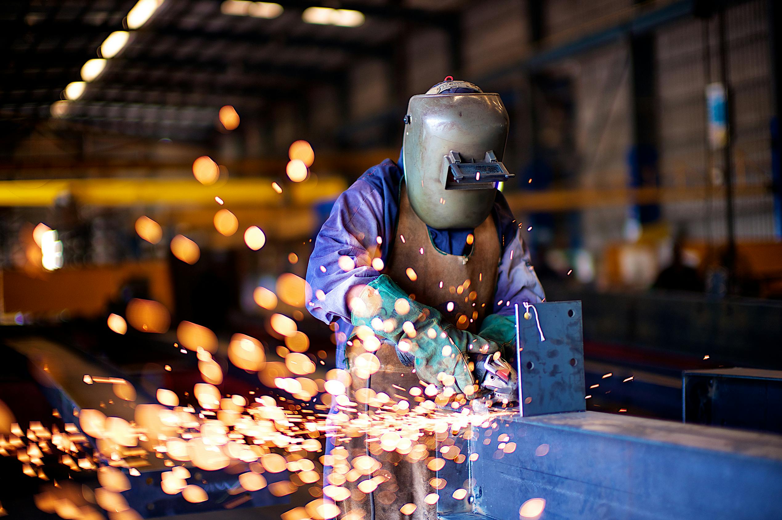 Welder Working in Protective Clothing